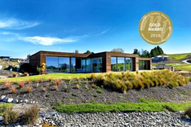 Front view House of the year gold winner 2016 newly built modern wood clad and glass house by Jason Gardiner Builders