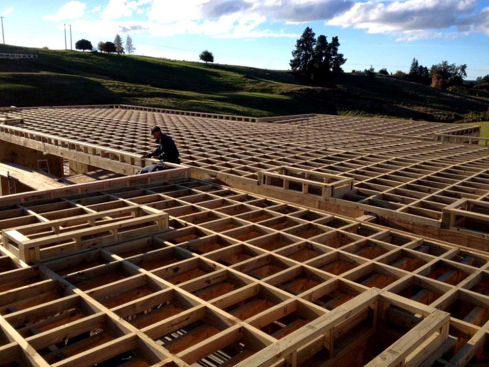 Team member putting together wooden foundation