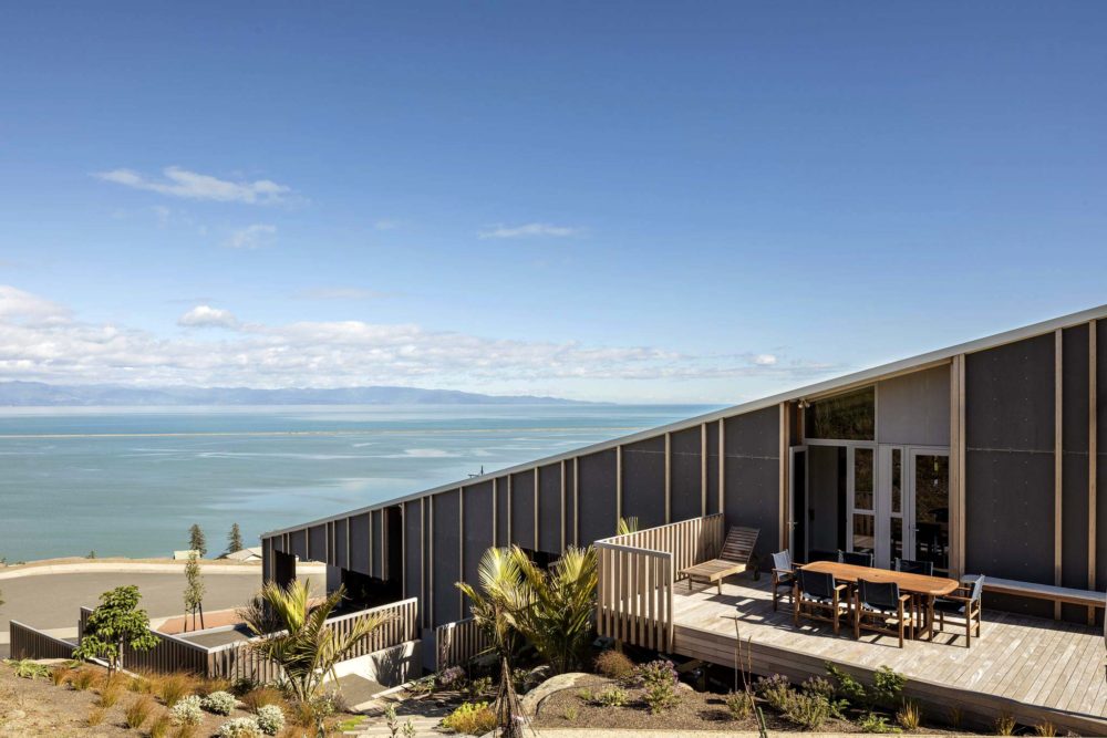 Side view of architectural award winning home with sea view